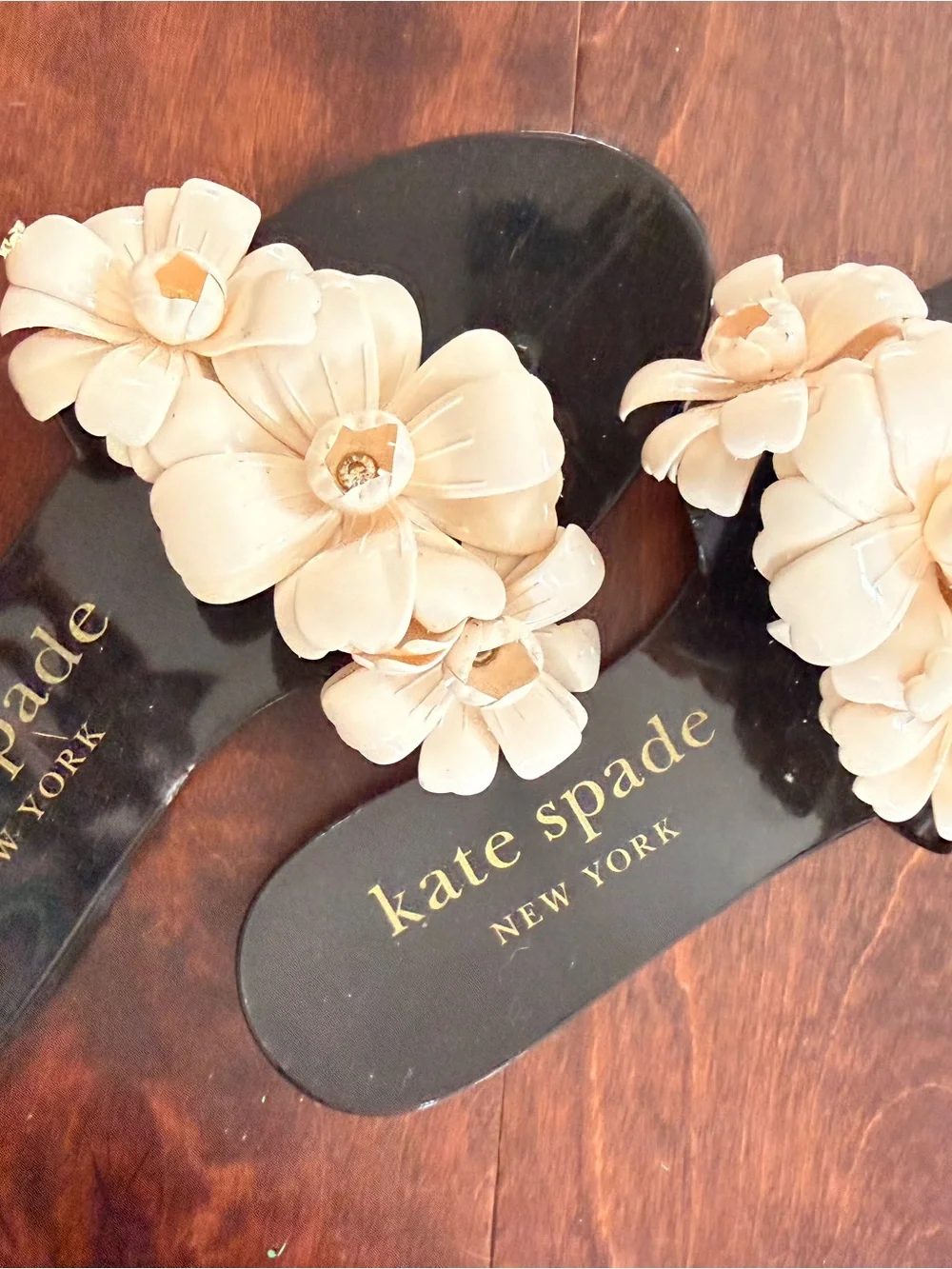 Sandal with floral embellishments